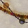 Swarovski crystals, knotted on silk thread and brown garnet necklace, both 16