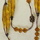 Hand cut yellow crystals with vermeil beads, knotted on silk thread, 36