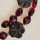 Black and red Bohemian glass beads, 25